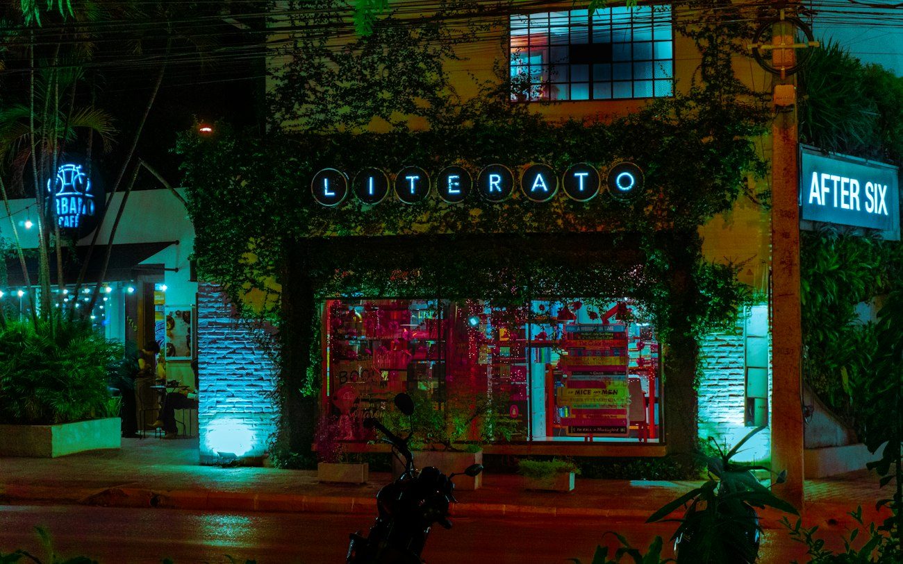 A lively street with a colourful storefront in Asunción.